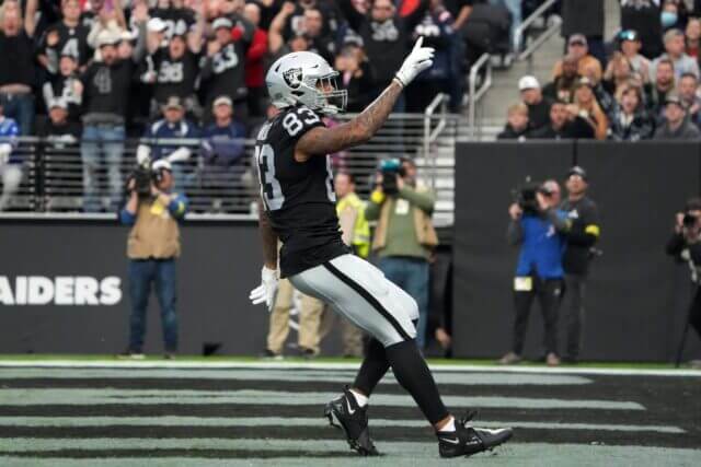 Dec 18, 2022; Paradise, Nevada, USA; Las Vegas Raiders tight end Darren Waller (83) scores on a 25-yard touchdown reception against the New England Patriots in the first half at Allegiant Stadium. The Raiders defeated the Patriots 30-24. Mandatory Credit: Kirby Lee-USA TODAY Sports Darren Waller, Raiders