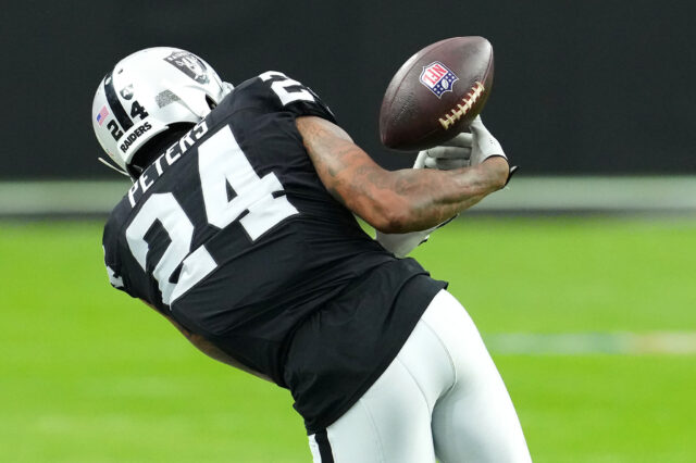 Nov 5, 2023; Paradise, Nevada, USA; Las Vegas Raiders cornerback Marcus Peters (24) nearly intercepts a New York Giants pass during the first quarter at Allegiant Stadium. Mandatory Credit: Stephen R. Sylvanie-USA TODAY Sports Marcus Peters, Raiders