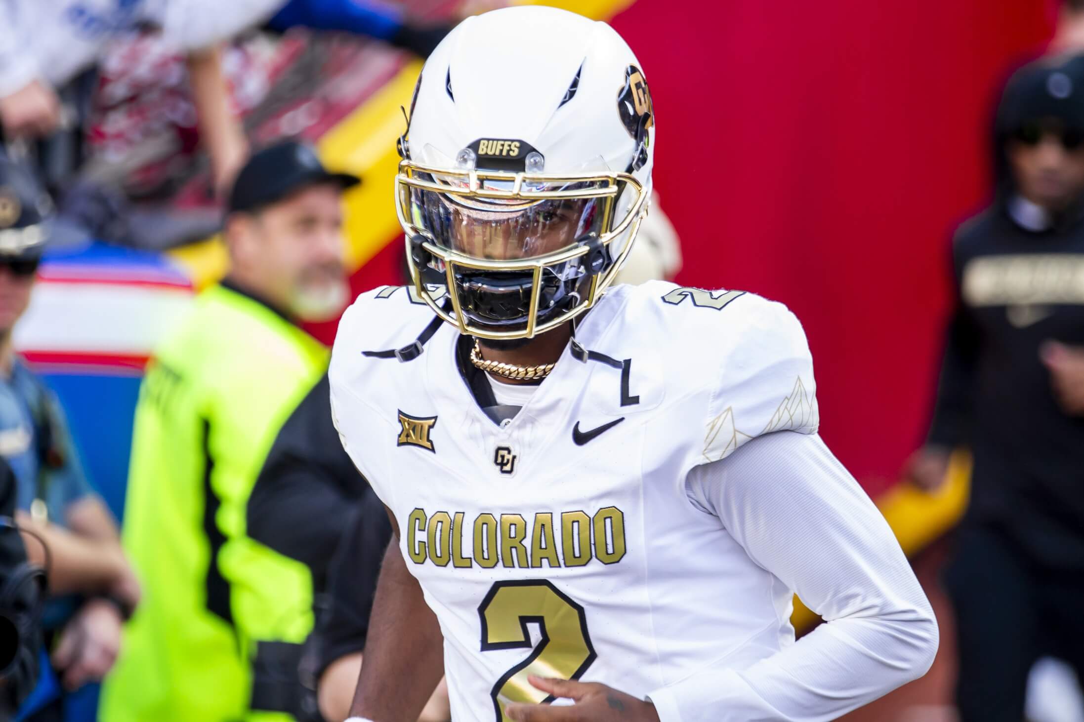 Nov 23, 2024; Kansas City, Missouri, USA; Colorado quarterback Shedeur Sanders (2) jogs onto the field during the game against the Kansas Jayhawks at GEHA Field at Arrowhead Stadium. Mandatory Credit: Nick Tre. Smith-Imagn Images Shedeur Sanders, Raiders, Colorado
