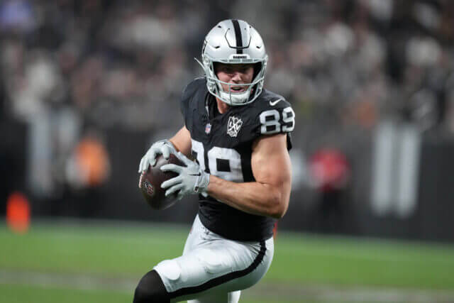 Dec 22, 2024; Paradise, Nevada, USA; Las Vegas Raiders tight end Brock Bowers (89) carries the ball against the Jacksonville Jaguars in the second half at Allegiant Stadium. Mandatory Credit: Kirby Lee-Imagn Images Brock Bowers, Raiders
