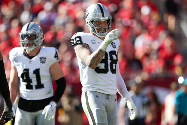 Dec 8, 2024; Tampa, Florida, USA; Las Vegas Raiders defensive end Maxx Crosby (98) celebrates after a sack against the Tampa Bay Buccaneers in the second quarter at Raymond James Stadium. Mandatory Credit: Nathan Ray Seebeck-Imagn Images Maxx Crosby, Raiders