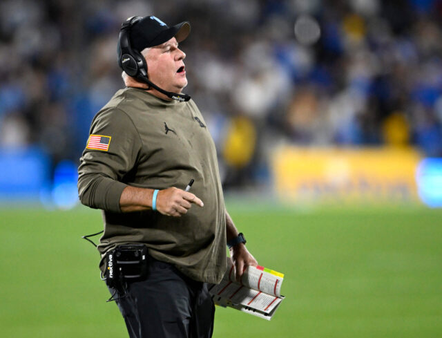 Nov 11, 2023; Pasadena, California, USA; UCLA Bruins head coach Chip Kelly talks to his players during the first half against the Arizona State Sun Devils at the Rose Bowl. Mandatory Credit: Alex Gallardo-USA TODAY Sports Chip Kelly, Raiders