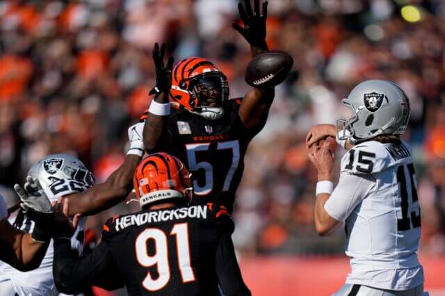 Cincinnati Bengals linebacker Germaine Pratt (57) pressures Las Vegas Raiders quarterback Gardner Minshew (15) as he throws in the first quarter of the NFL Week 9 game between the Cincinnati Bengals and the Las Vegas Raiders at Paycor Stadium in downtown Cincinnati on Sunday, Nov. 3, 2024. Germaine Pratt, Raiders